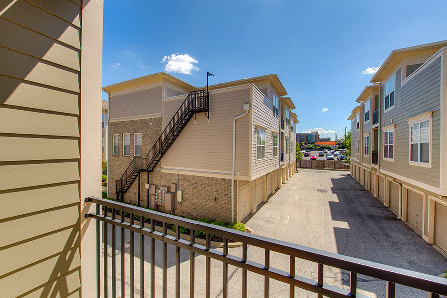 If you have a balcony like the ones at Waverly Apartments, install a mesh barrier to keep your child safe while playing. Balcony with a railing at Waverly Apartments