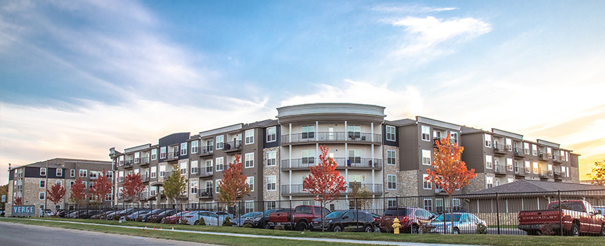 Exterior photo of The Verge Apartments in the fall season.