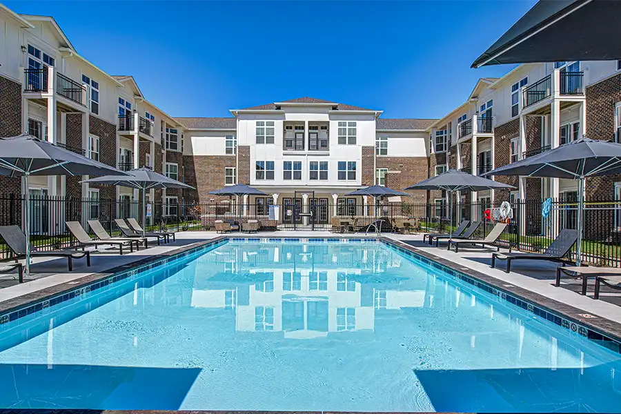 Not sure what a community means by amenities? This pool at City Flats at Renwick Apartments is one example of an amenity. Pristine pool surrounded by apartment buildings at City Flats at Renwick Apartments.